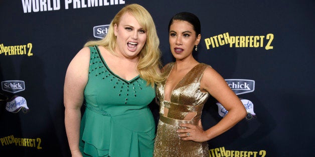 Rebel Wilson, left, and Chrissie Fit arrive at the world premiere of "Pitch Perfect 2" at Nokia Theatre L.A. Live on Friday,