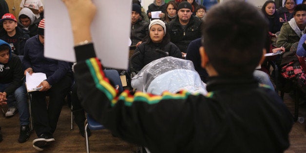 NEW YORK, NY - FEBRUARY 18: Immigrants prepare to fill out forms for Deferred Action for Childhood Arrivals...