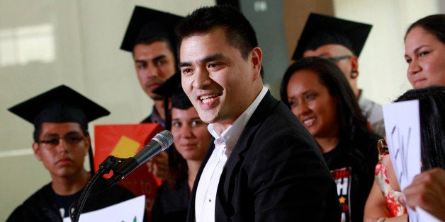 Former Washington Post journalist turned immigration reform activist, Jose Antonio Vargas, center, an illegal immigrant himself, speaks at an informational news conference supporting President Obama's announcement to stop deportations of younger illegal immigrants who came to the U.S. as children, in Washington, on Wednesday, June 20, 2012. (AP Photo/Jacquelyn Martin)