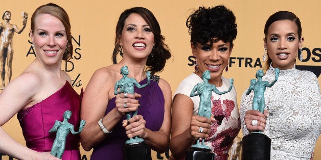 Emma Myles, from left, Elizabeth Rodriguez, Selenis Leyva and Dascha Polanco pose in the press room with the award for outstanding ensemble in a comedy series for âOrange is the New Blackâ at the 21st annual Screen Actors Guild Awards at the Shrine Auditorium on Sunday, Jan. 25, 2015, in Los Angeles. (Photo by Jordan Strauss/Invision/AP)