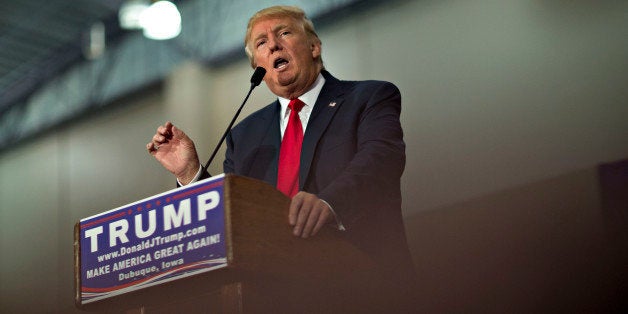 Donald Trump, president and chief executive of Trump Organization Inc. and 2016 Republican presidential candidate, speaks during a rally at Grand River Center in Dubuque, Iowa, U.S., on Tuesday, Aug. 25, 2015. President Barack Obama's top business ambassador dismissed Trump's call for a wall along the Mexico border, saying the U.S. is focused instead on expanding business with one of its biggest trade partners. Photographer: Daniel Acker/Bloomberg via Getty Images 