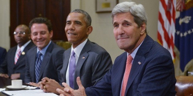 US President Barack Obama (2nd R) and Secretary of State John Kerry meet with veterans and Gold Star Mothers to discuss the Iran nuclear deal on September 10, 2015 in the Roosevelt Room of the White House in Washington, DC. AFP PHOTO/MANDEL NGAN (Photo credit should read MANDEL NGAN/AFP/Getty Images)