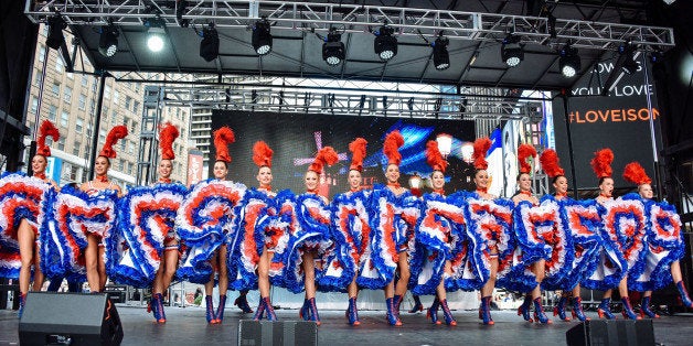 NEW YORK, NY - SEPTEMBER 27: Moulin Rouge dancers perform at the Best Of France main stage in Times Square on September 27, 2015 in New York City. This stop was part of Moulin Rouge's first time visit to New York City in its history. (Photo by Grant Lamos IV/Getty Images)