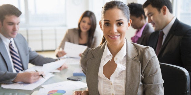 Businesswoman smiling in meeting