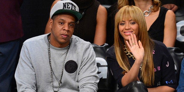 NEW YORK, NY - NOVEMBER 26: Jay-Z and Beyonce Knowles attend the New York Knicks v Brooklyn Nets game at Barclays Center on