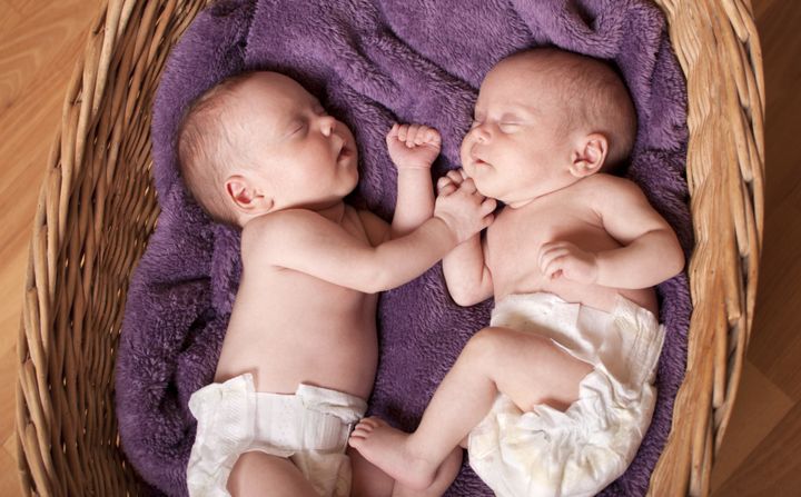 little newborn twins are...