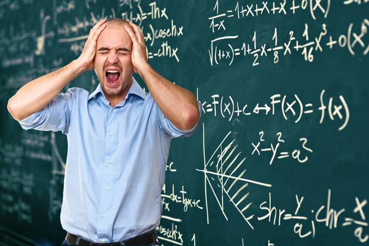 stressed man and blackboard...