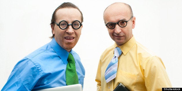 Two crazy businessman with laptops