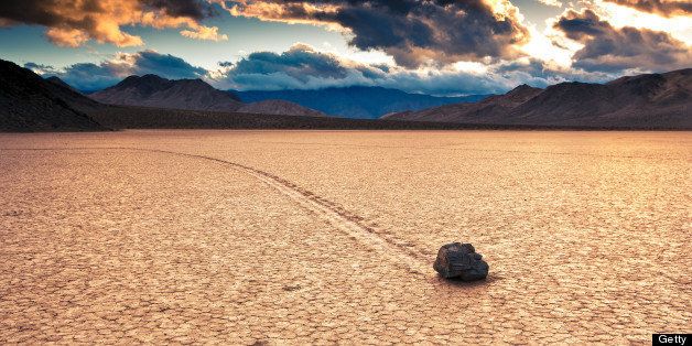 A stone mysteriously sails across the playa at the Racetrack in Death Valley.