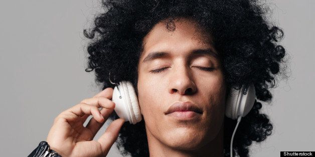 portrait of a dj man listening...