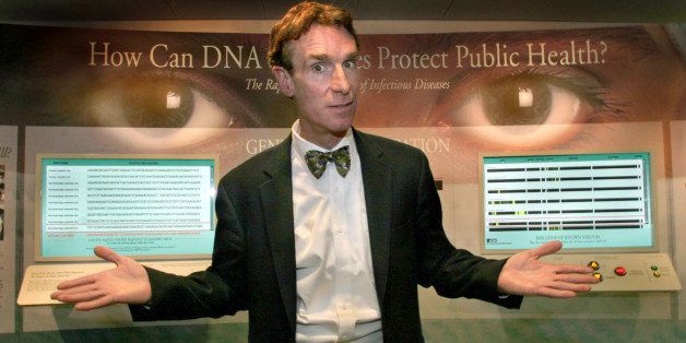 ST-NYE Photos by Michael Williamson NEG#161493 12/02/04 -- Bill Nye ('the Science guy') in front of a display showing how DNA research uncovered the SARS virus. He's at the Marian Koshland Science Museum of the National Academy of Sciences at 6th and E sts. NW. (Photo by Michael Williamson/The Washington Post/Getty Images)