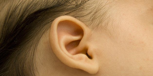 closeup of a newborn baby ear...