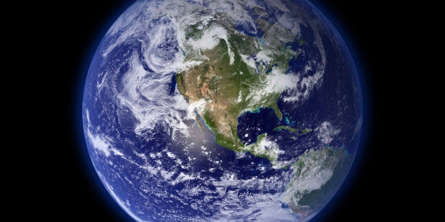 'Montage of the earth, with a glowing blue atmosphere, and the moon in one frame. (Some graphics in this image is provided by