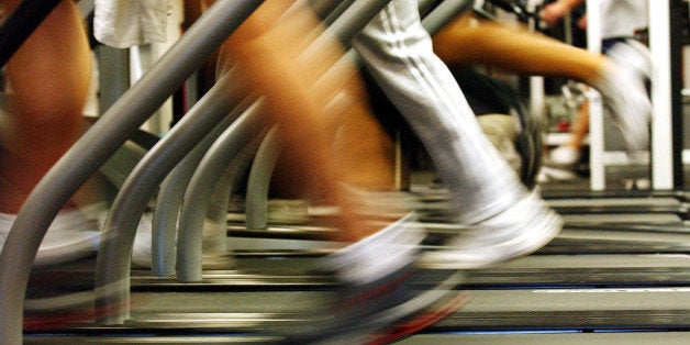 BROOKLYN, NEW YORK - JANUARY 2: People run on treadmills at a New York Sports Club January 2, 2003 in Brooklyn, New York. Thousands of people around the country join health clubs in the first week of the new year as part of their New Year's resolution. Many health clubs see a surge in business of 25 percent immediately after the new year, only to see those numbers level off by spring. (Photo by Spencer Platt/Getty Images) 