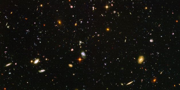 IN SPACE: In this NASA handout, a view of nearly 10,000 galaxies are seen in a Hubble Telescope composite photograph released March 9, 2004. The Hubble Ultra Deep Field (HUDF) photograph is a composite of a million one-second exposures and reveals galaxies from the time shortly after the big bang. (Photo by NASA/Getty Images)