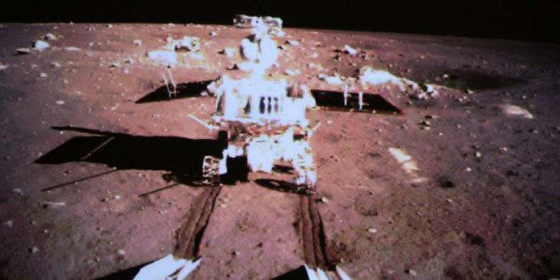 Edited image from the Xinhaunet web site showing the Chinese Yutu rover fully on the Moon. I'm not fully certain but I think this is a Chinese National Space Agency (CNSA) program; I went to their web site but they didn't say anything about Yutu (in English or Chinese (translated by Google)). The news site seems to have claimed a copyright to this image but I suspect the Chinese government may have other ideas...