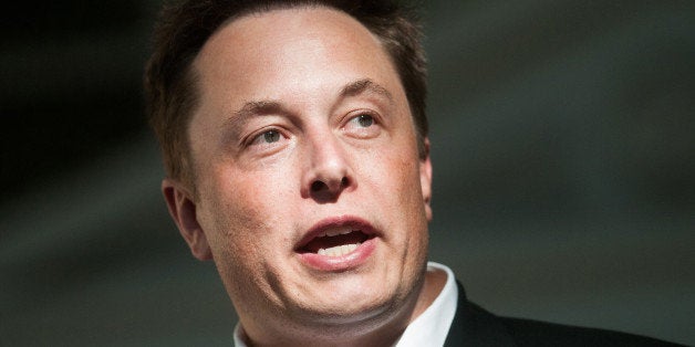 Elon Musk, co-founder and chief executive officer of Tesla Motors Inc., speaks during a news conference at the Nevada State Capitol building in Carson City, Nevada, U.S., on Thursday, Sept. 4, 2014. Tesla will build the worlds largest lithium-ion battery plant in Nevada, bringing a $100 billion boost to the states economy over two decades, Governor Brian Sandoval said. Photographer: David Calvert/Bloomberg via Getty Images