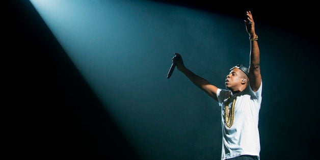 LONDON, UNITED KINGDOM - OCTOBER 10: Jay Z performs on stage at O2 Arena on October 10, 2013 in London, England. (Photo by Neil Lupin/Redferns via Getty Images)