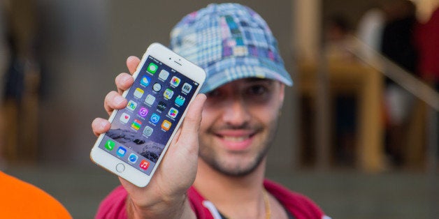 First day of the IPhone 6 and IPhone 6 Plus release in Spain with the firsts buyers in the Barcelona's city Apple Store. September 26th of 2014. Catalonia Europe.