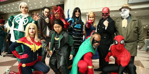 NEW YORK, NY - OCTOBER 10: Cosplay fans attend the opening day of New York Comic Con 2013 at The Jacob K. Javits Convention Center on October 10, 2013 in New York City. New York Comic Con is one of the largest comic book and science fiction conventions. The convention brings together fans of fantasy role playing, science fiction, movies and television. (Photo by Neilson Barnard/Getty Images)