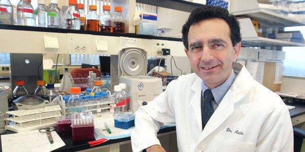 Dr. Anthony Atala, head of Wake Forest's regenerative medicine institute, is photographed in his research lab at Piedmont Triad Research Park in Winston-Salem, NC, Friday, Jan. 5, 2007. Scientists reported Sunday they had found a plentiful source of stem cells in the fluid that cushions babies in the womb and produced a variety of tissue types from these cells _ sidestepping the controversy over destroying embryos for research. Researchers at Wake Forest University and Harvard University reported the stem cells they drew from amniotic fluid donated by pregnant women hold much the same promise as embryonic stem cells. (AP Photo/Lynn Hey)
