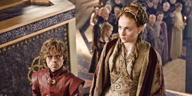 This publicity image released by HBO shows Peter Dinklage, left, and Sophie Turner in a scene from "Game of Thrones." The program was nominated for an Emmy Award for outstanding drama series on, Thursday July 18, 2013. The Academy of Television Arts & Sciences' Emmy ceremony will be hosted by Neil Patrick Harris. It will air Sept. 22 on CBS. (AP Photo/HBO, Helen Sloan)