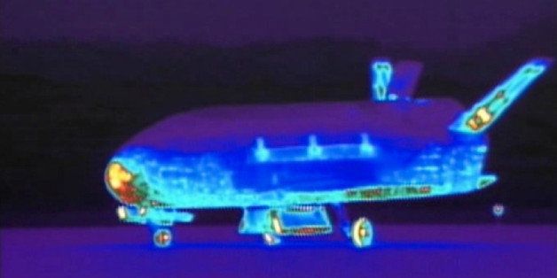 This June 16, 2012 file image from video made available by the Vandenberg Air Force Base shows an infrared view of the X-37B unmanned spacecraft landing at Vandenberg Air Force Base. The purpose of the U.S. military's space plane is classified, only fueling speculation about why it has been orbiting Earth for nearly two years on this, its third mission. The plane is expected to land this week at a Southern California Air Force base.(AP Photo/Vandenberg Air Force Base, File)
