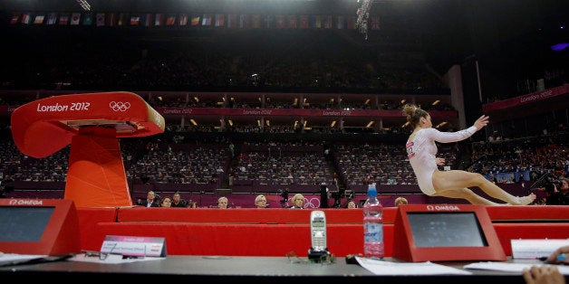 U.S. gymnast McKayla Maroney botches her dismount during the artistic gymnastics women's vault finals at the 2012 Summer Olympics, Sunday, Aug. 5, 2012, in London. (AP Photo/Julie Jacobson)