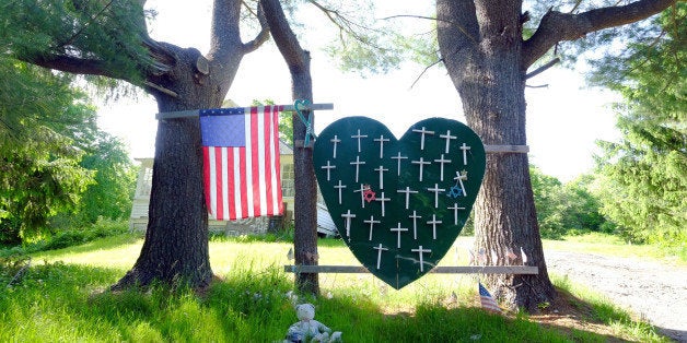 Sandy Hook Elementary School shooting, heart and cross memorial near Sandy Hook Firehouse on Riverside Road in Sandy Hook, CT (Photo By: Enid Alvarez/NY Daily News via Getty Images)