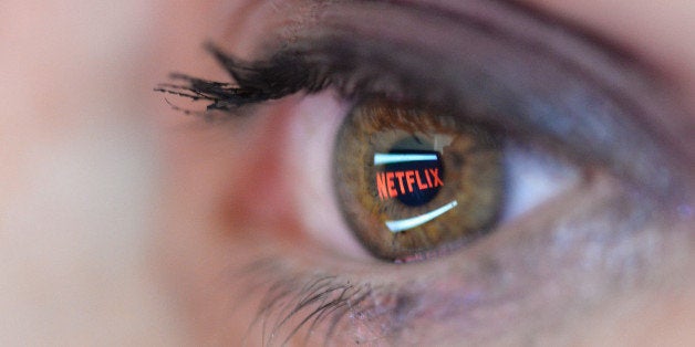 PARIS, FRANCE - SEPTEMBER 19: In this photo illustration the Netflix logo is reflected in the eye of a woman on September 19, 2014 in Paris, France. Netflix September 15 launched service in France, the first of six European countries planned in the coming months. (Photo by Pascal Le Segretain/Getty Images)