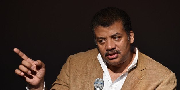 Neil deGrasse Tyson, astrophysicist, 'Cosmos' television show host and Frederick P. Rose Director of the Hayden Planetarium at the American Museum of Natural History speaks August 4, 2014 after a screening of James Cameron's 'Deepsea Challenge 3D' film at the museum in New York. AFP PHOTO/Stan HONDA (Photo credit should read STAN HONDA/AFP/Getty Images)