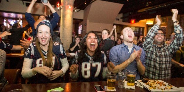 OSTON, MA - FEBRUARY 1: New England Patriots fans cheer after the Patriots defeated the Seattle Seahawks in Super Bowl XLIX