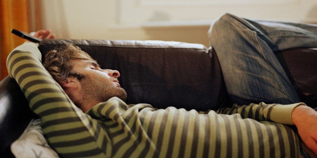 Man asleep on sofa, close-up