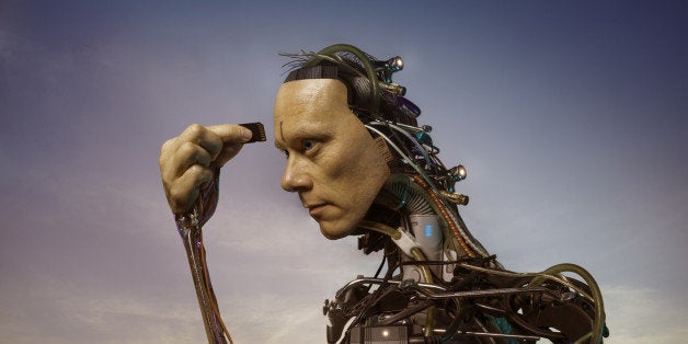 The head and shoulders of an android robot or cyborg inserting a memory card into his forehead.