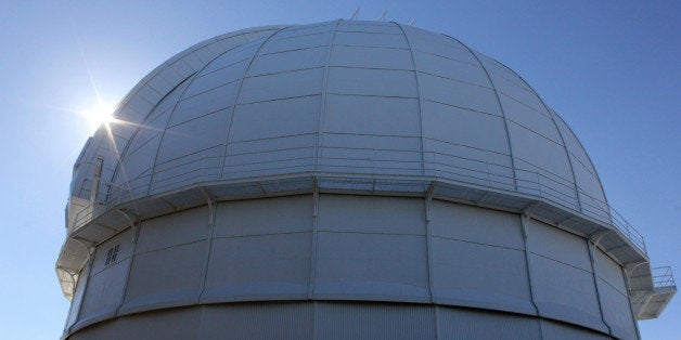 In this Aug. 9, 2014 photo, the sun glints off the dome of historic Mount Wilson Observatory in the San Gabriel Mountains northeast of Los Angeles. President Barack Obama on Friday, Oct. 10, 2014 designated 346,000 acres of the range as a national monument. The president said: âWithin these hills lies millennia of history including the ancient rock art of native peoples, the first Americans. And just as this region teaches us about our past it has always offered us a window into the future. It was here at the Mount Wilson Observatory that Edwin P. Hubble showed the universe to be ever expanding and it's where astronomers still explore the mysteries of space." Obama used his authority under the federal Antiquities Act, a move that cheered environmentalists but sparked new criticism of Obama's willingness to use his executive authority.(AP Photo/John Antczak)