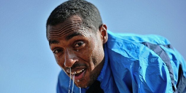 TO GO WITH AFP STORY BY JENNY VAUGHAN Ethiopia's long distance and marathon runner Kenenisa Bekele takes a break at his train