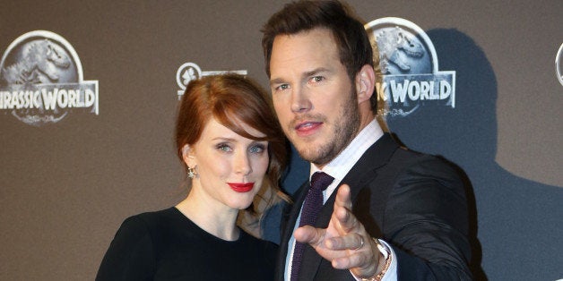 U.S. actors Bryce Dallas Howard, left, and Chris Pratt pose for photograpers as they arrive at the French premiere of U.S. movie Jurassic World in Paris, Friday May 29, 2015. (AP Photo/Remy de la Mauviniere) at the French premiere of U.S. movie Jurassic World in Paris, Friday May 29, 2015. (AP Photo/Remy de la Mauviniere)