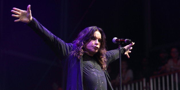 Ozzy Osbourne of Black Sabbath performs at the Lollapalooza festival in Chicago's Grant Park on Friday, Aug. 3, 2012. (Photo by Steve C. Mitchell/Invision/AP)