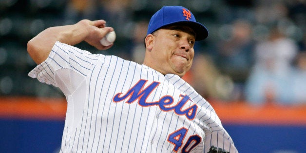 FILE - In this May 15, 2015, file photo, New York Mets' Bartolo Colon delivers a pitch during the first inning of a baseball game against the Milwaukee Brewers in New York. Colon remains one of the most effective pitchers in the major leagues, baffling hitters with one pitch _his fastball_ and an uncanny control reminiscent of his Cy Young year. (AP Photo/Frank Franklin II, File)