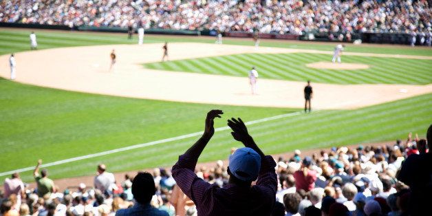 USA, Seattle, baseball fans cheering in stadium