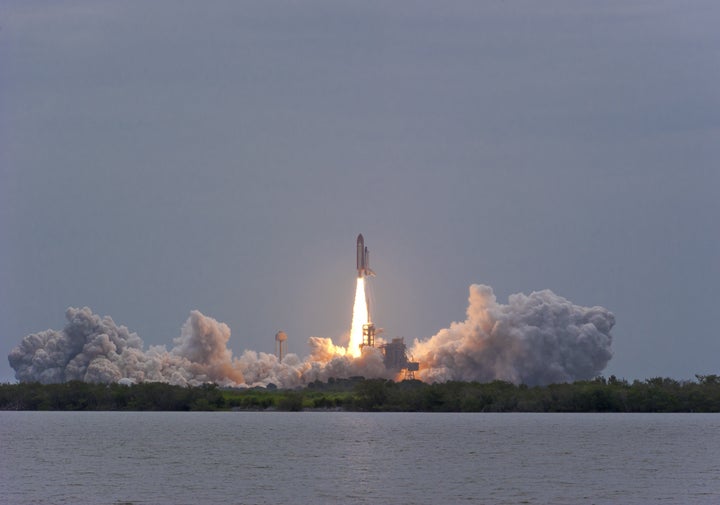 space shuttle atlantis clears...