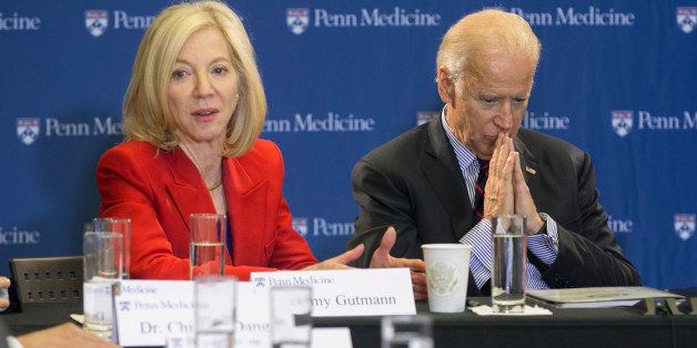Vice president Joe Biden launches his 'Moon Shot' mission to cure cancer with a tour of the University of Pennsylvania's Abramson Cancer Center and a roundtable conversation with researchers there on Friday, Jan. 15, 2016. At the roundtable discussion, Biden, right, takes a moment to reflect as he listens to Penn President Amy Gutmann and leading cancer researchers. (Ed Hille/Philadelphia Inquirer/TNS via Getty Images)