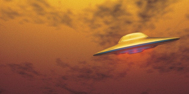 UFO Flying Through Yellowish Sky