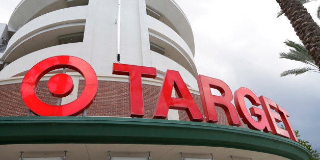 FILE - This Monday, Aug. 11, 2015, file photo, shows a Target store in Miami. Consumer backlash is growing against Targetâs stance on what type of bathrooms its transgender customers and employees can use. In April 2016, the Minneapolis-based discounter issued a statement that said customers and employees can use the restroom or fitting room that âcorresponds to their gender identity.â The move made Target the first major retailer to take such a prominent position on the issue, and won praise from supporters of transgender rights. But Targetâs position also sparked criticism on social media that hasnât let up. (AP Photo/Lynne Sladky, File)