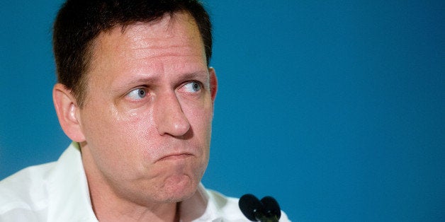 Peter Thiel, head of Clarium Capital Management LLC and founding investor in PayPal Inc. and Facebook Inc., listens during the LendIt USA 2016 conference in San Francisco, California, U.S., on Tuesday, April 12, 2016. Thiel discussed his outlook for the tech industry. Photographer: Noah Berger/Bloomberg via Getty Images 