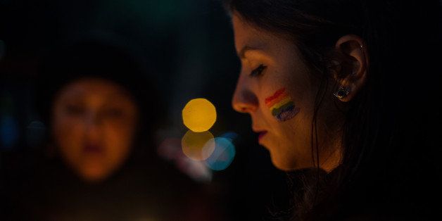 SAO PAULO, BRAZIL - JUNE 15: Brazilians linked to LGBT movements are protesting in solidarity with the victims of the terrorist attack that killed 49 people in gay nightclub in Orlando, Florida last Sunday on June 15, 2016 in Sao Paulo, Brazil. In Brazil, a homosexual is killed every 26 hours. (Photo by Victor Moriyama/Getty Images)