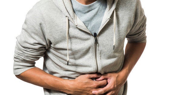 Man suffering from stomach pain