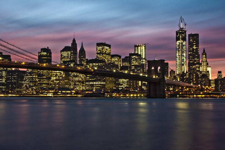 Brooklyn Bridge, East River and Lower Manahttan at dusk