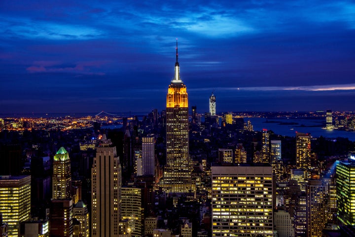 NEW YORK, NY - NOVEMBER 01: The Midtown skyline remains lit as Lower Manhattan remains mostly without power on November 1, 2