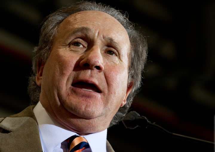 Michael Reagan, a radio show talk host and son offormer US president Ronald Reagan, delivers opening remarks shortly before the arrival of Republican presidential hopeful, former House Speaker Newt Gingrich, inside an aircraft hangar at the Tampa Jet Center, January 30, 2012, in Tampa, Florida. AFP Photo/Paul J. Richards (Photo credit should read PAUL J. RICHARDS/AFP/Getty Images)